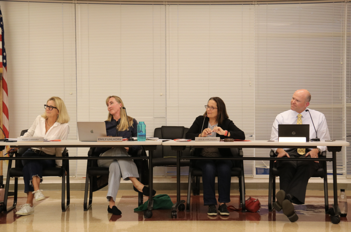 TUHSD board members Karen Loebakka and Leslie Harlander listen to Tamalpais High School student board representative Ruby Kosek speak about implementing Yondr pouches and how she believes they are ineffective. (Photo by Julia Delsol)